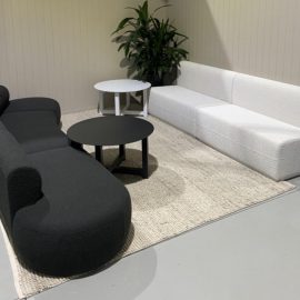 Black Curved lounge & White Settee.